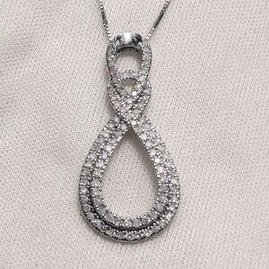 1/2 CT. T.W. Diamond Double Infinity Loop Pendant in 10K White Gold